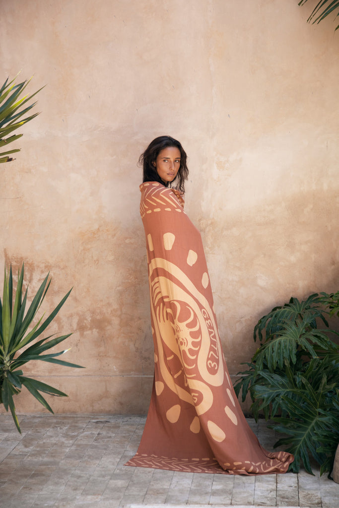 model wearing artist print sarong 