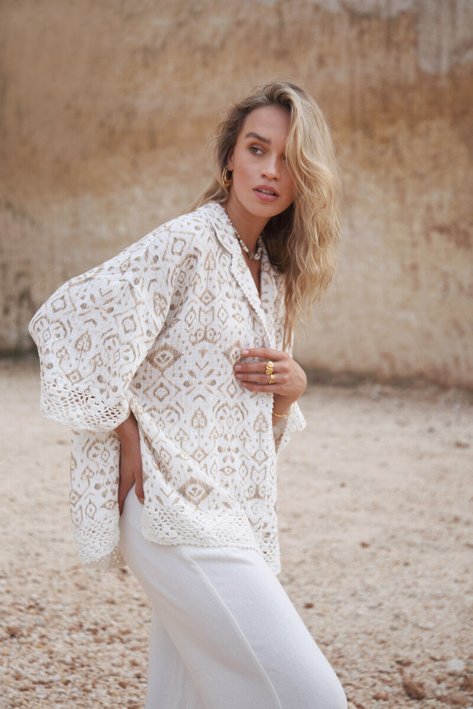 womens white print shirt with crochet front view
