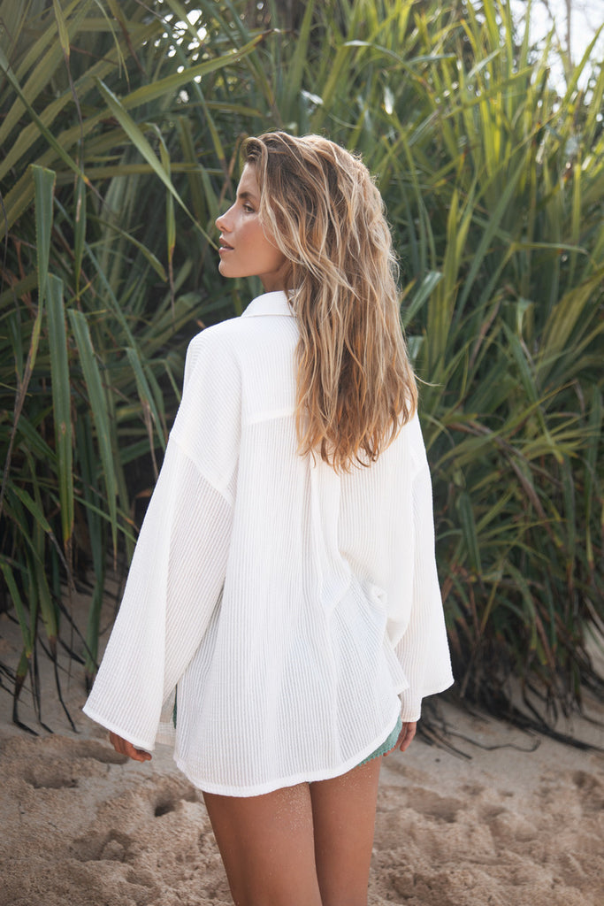 back view of womens white cotton textured shirt