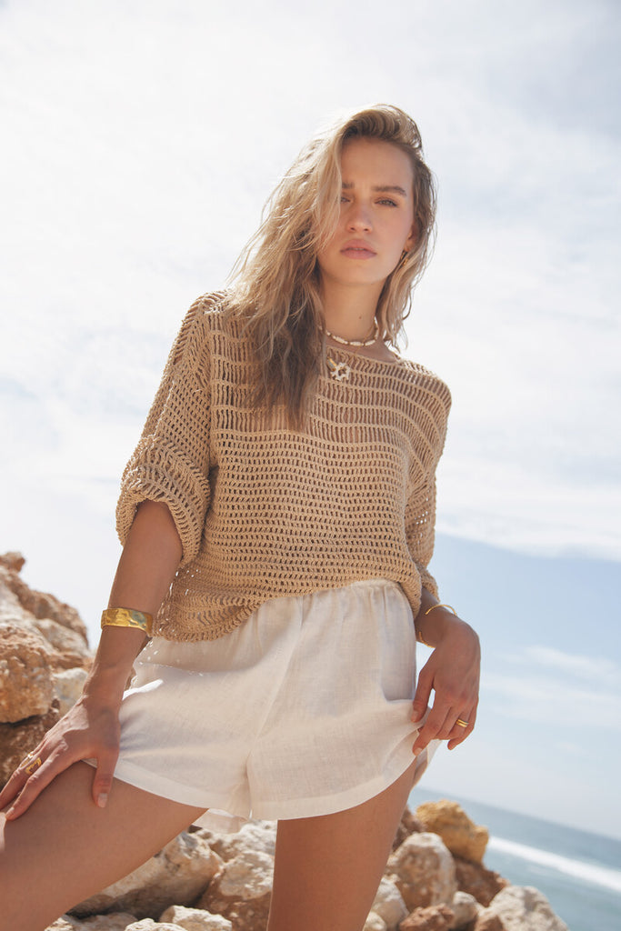 model wearing natural cotton crochet top 