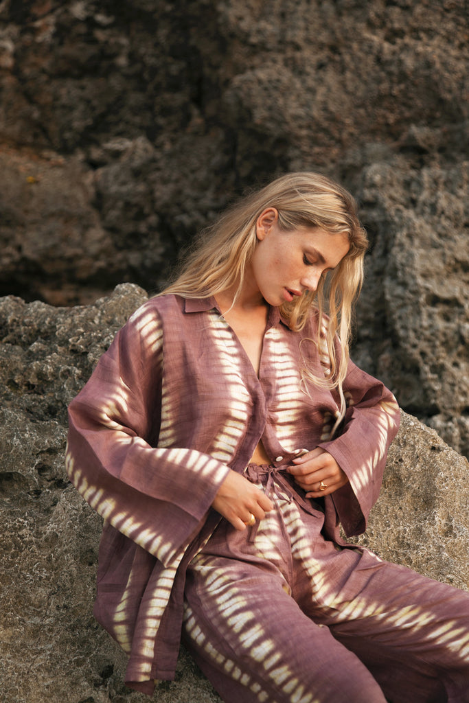 model wearing tie dye linen set