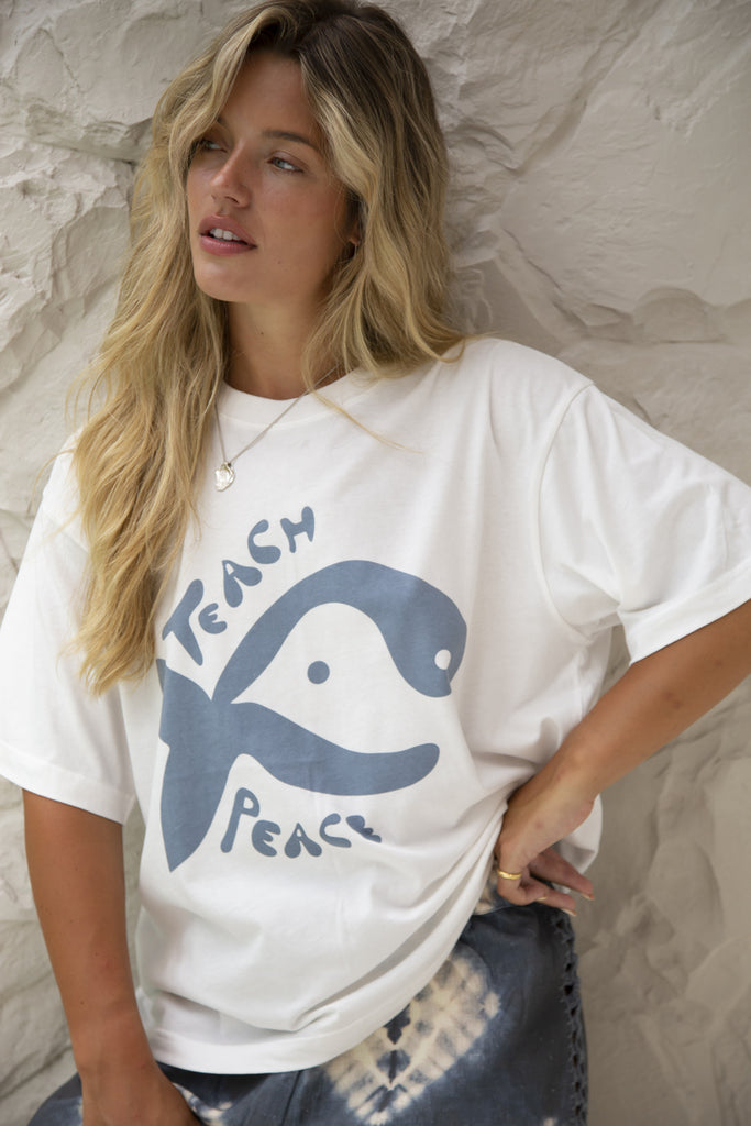 maurie and eve blue teach peace tee